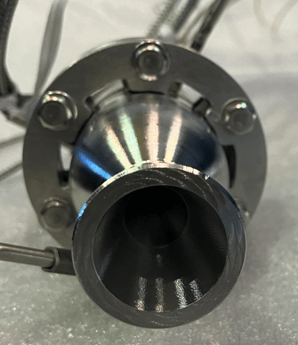 A close up of a metal object

Description automatically generated